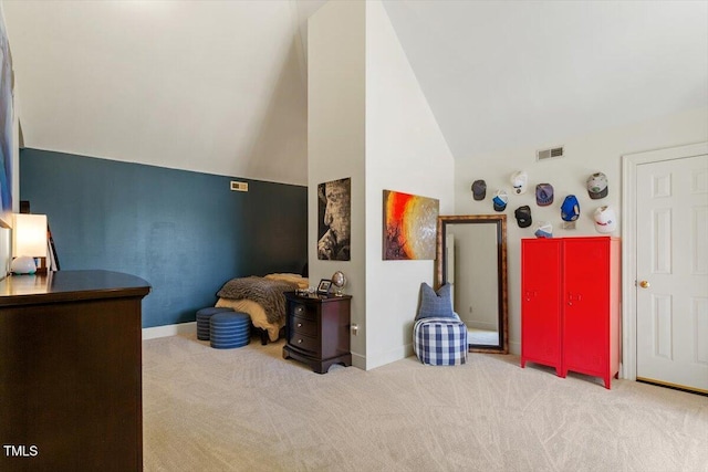 bedroom featuring visible vents, baseboards, carpet, and high vaulted ceiling