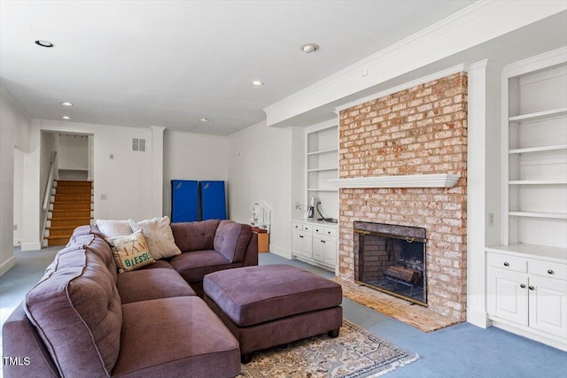 carpeted living room featuring stairs, built in features, a fireplace, and visible vents