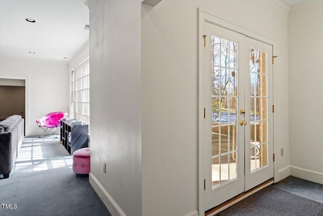 entryway featuring carpet flooring, french doors, baseboards, and ornamental molding