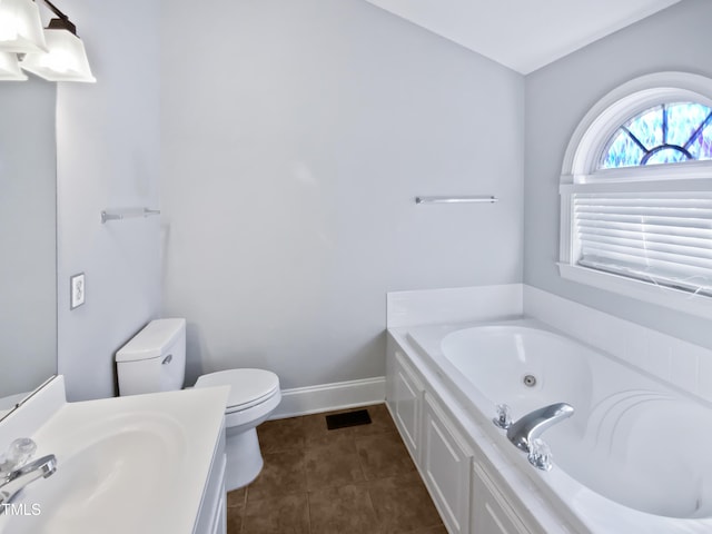 full bath featuring visible vents, toilet, a jetted tub, tile patterned flooring, and baseboards