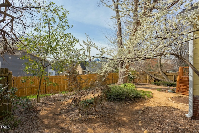 view of yard featuring fence private yard