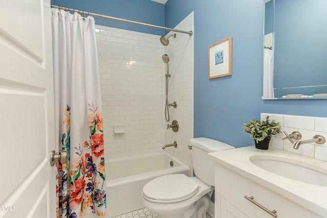 full bathroom with toilet, vanity, and shower / bath combination with curtain