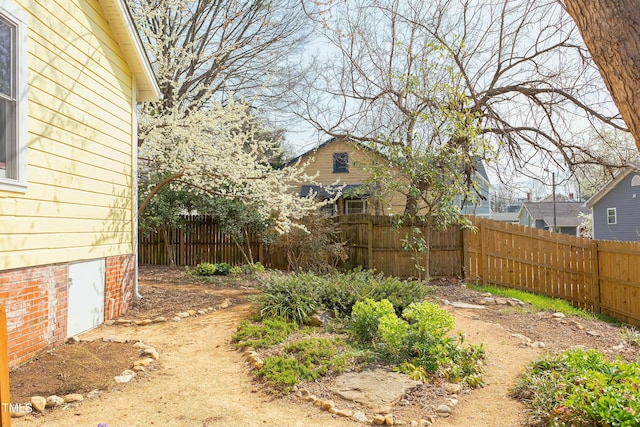 view of yard featuring fence