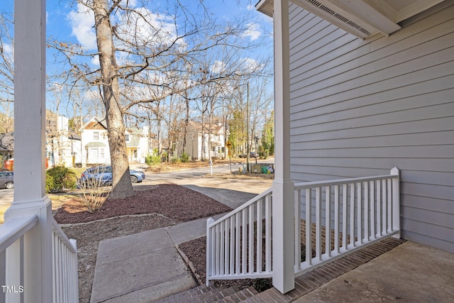 view of patio / terrace featuring a residential view and a porch