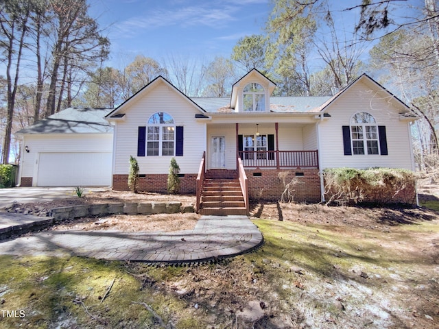 ranch-style house featuring crawl space, stairway, covered porch, and driveway