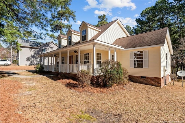 view of front of property featuring crawl space, covered porch, a shingled roof, and ceiling fan