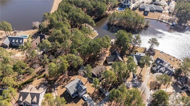 birds eye view of property with a residential view and a water view