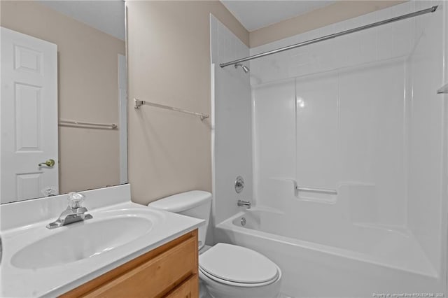 full bathroom with toilet, vanity, and shower / bathing tub combination