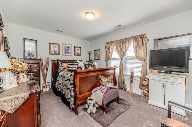 carpeted bedroom with visible vents