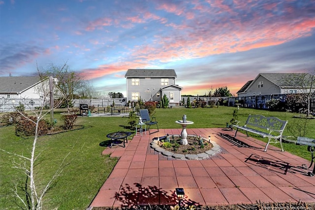 view of patio with fence and an outdoor fire pit