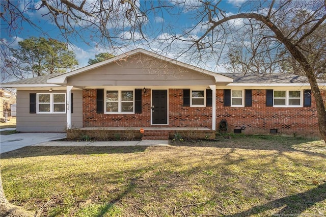 ranch-style house with crawl space, concrete driveway, a front lawn, and brick siding