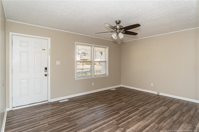 foyer featuring dark wood-style flooring and ornamental molding