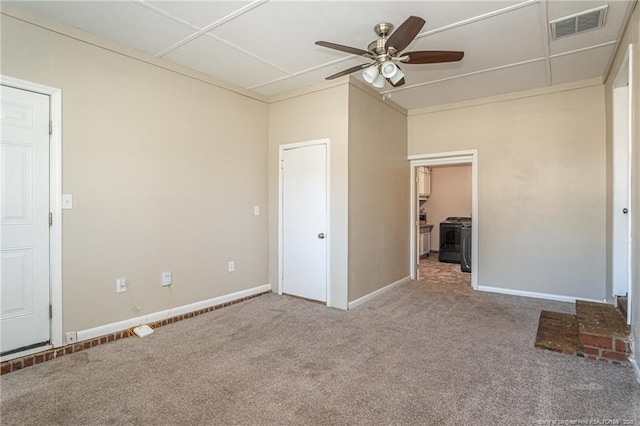 unfurnished bedroom with visible vents, carpet flooring, baseboards, and ceiling fan