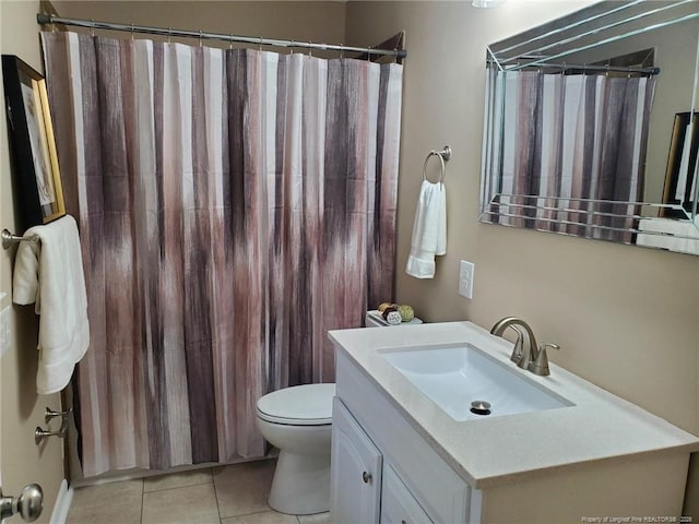 full bath with a shower with shower curtain, toilet, vanity, and tile patterned flooring