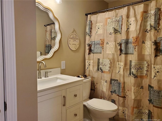 full bathroom featuring toilet and vanity