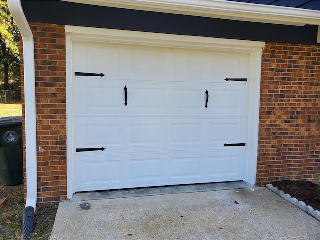 garage featuring driveway