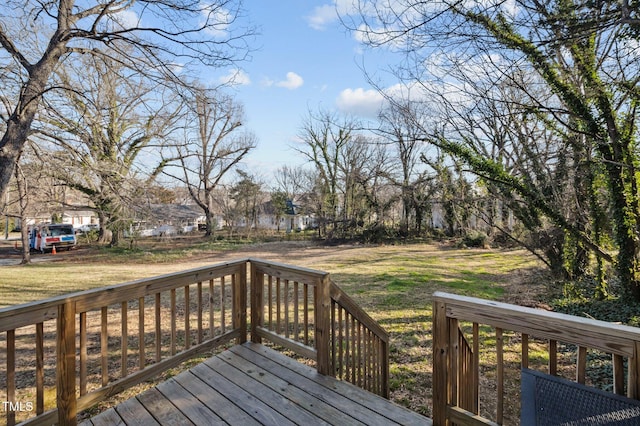 deck featuring a yard