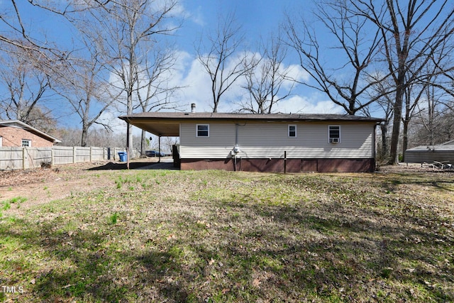 back of property with fence