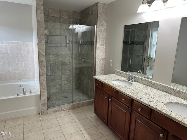 full bathroom featuring a shower stall, a bath, double vanity, and a sink