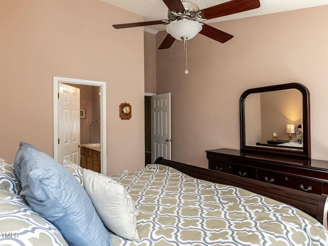 bedroom with a high ceiling, ceiling fan, and ensuite bathroom