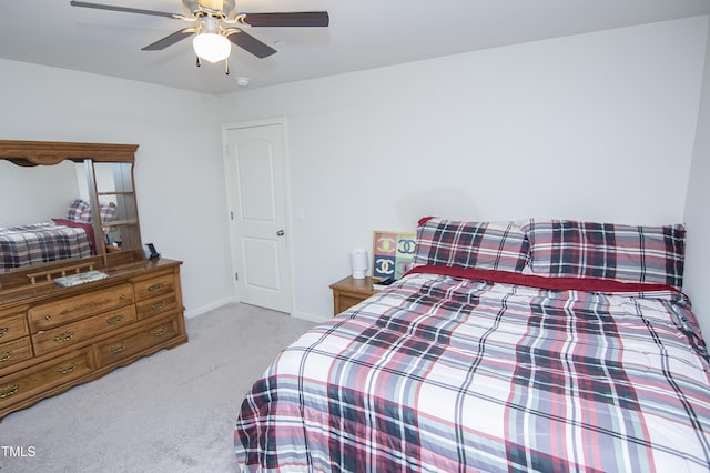 bedroom featuring baseboards, carpet, and a ceiling fan