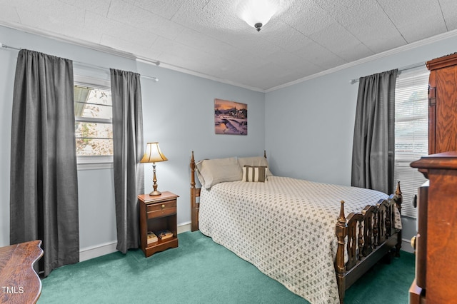 carpeted bedroom with multiple windows, crown molding, and baseboards