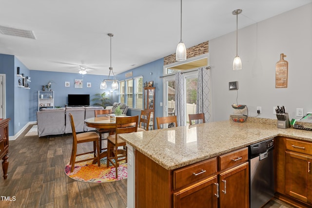 kitchen featuring dark wood-style floors, visible vents, a ceiling fan, stainless steel dishwasher, and decorative light fixtures