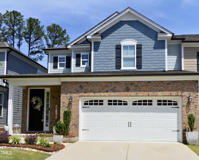 938 Haybeck Ln, Apex, NC 27523 - craftsman-style house with driveway, an attached garage, and brick siding