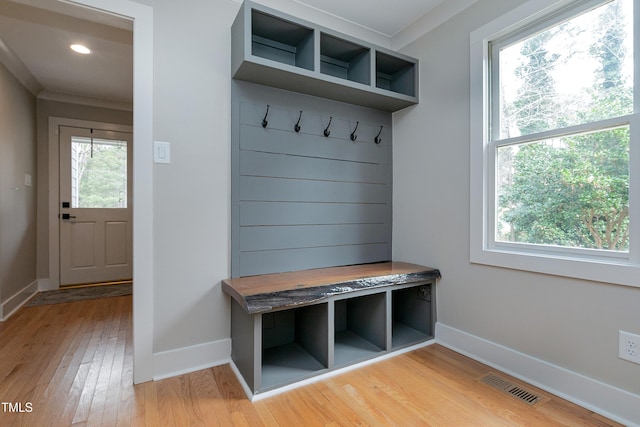 mudroom with recessed lighting, light wood-style floors, visible vents, and baseboards