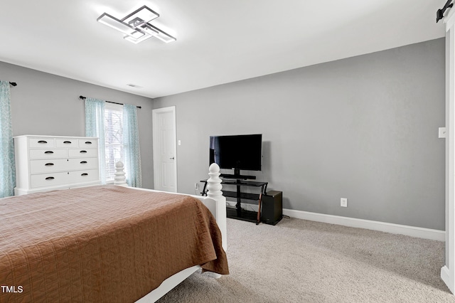 bedroom featuring visible vents, carpet, and baseboards