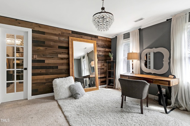 office area with visible vents, a chandelier, carpet flooring, and crown molding