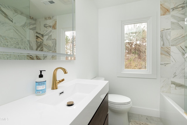 bathroom with vanity, baseboards, visible vents, walk in shower, and toilet