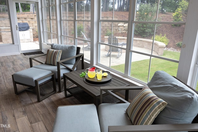 sunroom / solarium featuring plenty of natural light