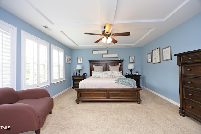 bedroom featuring visible vents, baseboards, light carpet, and a ceiling fan