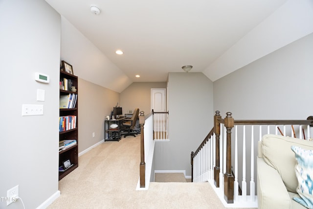 interior space with recessed lighting, baseboards, carpet flooring, and vaulted ceiling