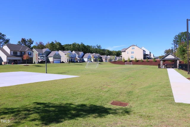 view of yard with a gazebo and a residential view