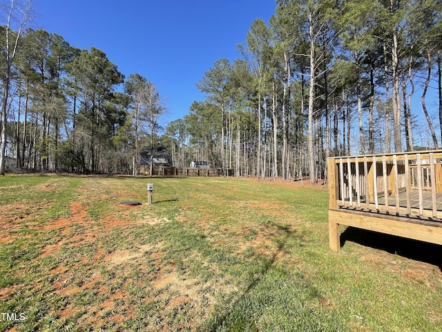view of yard with a deck