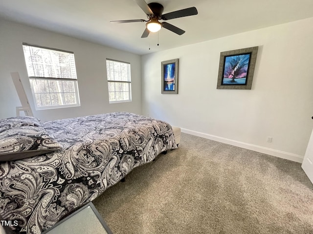 bedroom featuring baseboards, carpet flooring, and ceiling fan