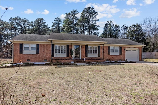 ranch-style home with crawl space, brick siding, a garage, and fence