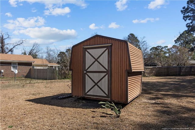 view of shed featuring a fenced backyard