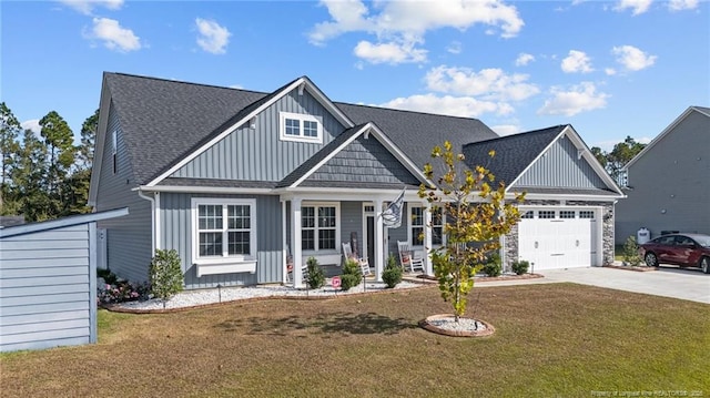 view of front of property with an attached garage, board and batten siding, a front lawn, roof with shingles, and driveway