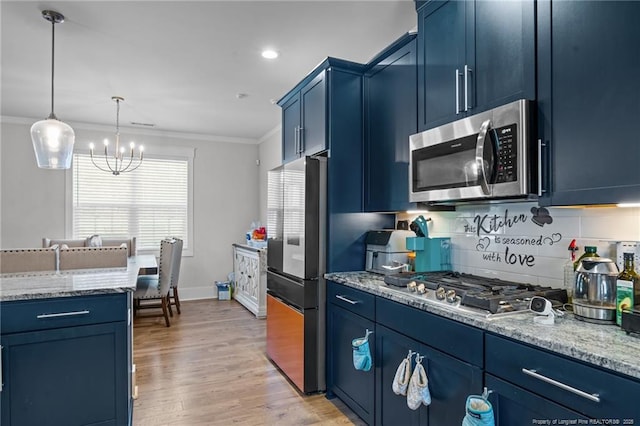 kitchen featuring blue cabinetry, appliances with stainless steel finishes, crown molding, and light wood finished floors