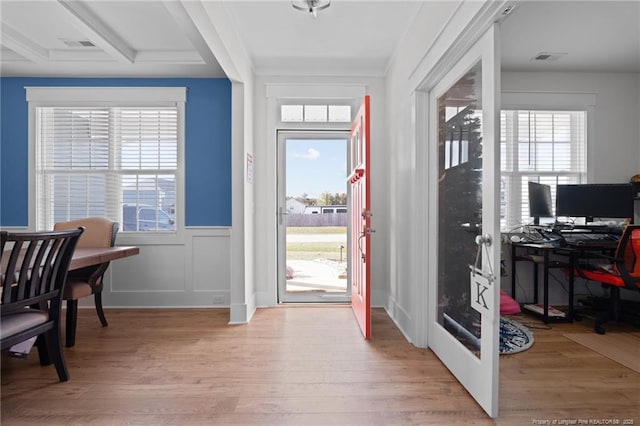 entrance foyer with french doors, visible vents, and light wood finished floors