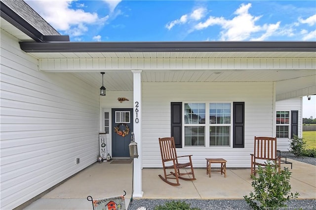 entrance to property with a porch