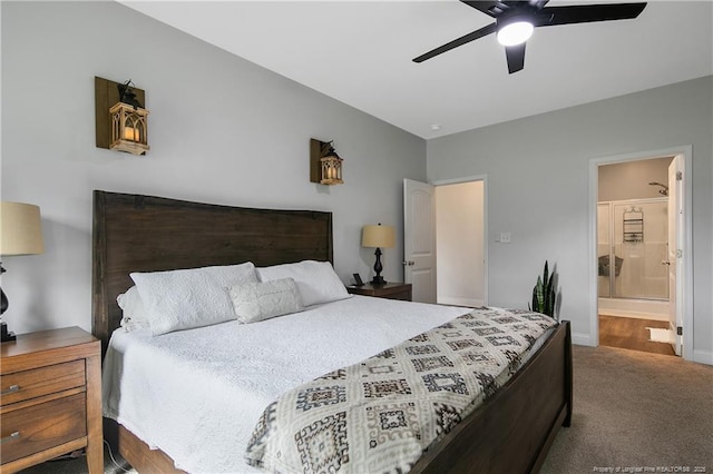 bedroom with baseboards, ensuite bathroom, ceiling fan, and carpet flooring