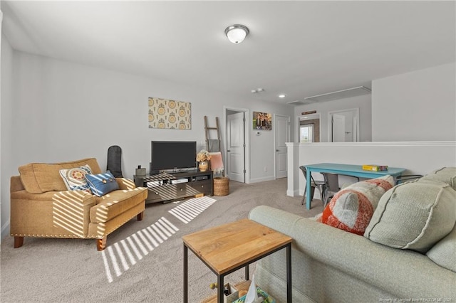 living room featuring baseboards and carpet