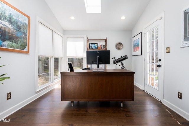 home office with recessed lighting, baseboards, vaulted ceiling with skylight, and dark wood-style floors