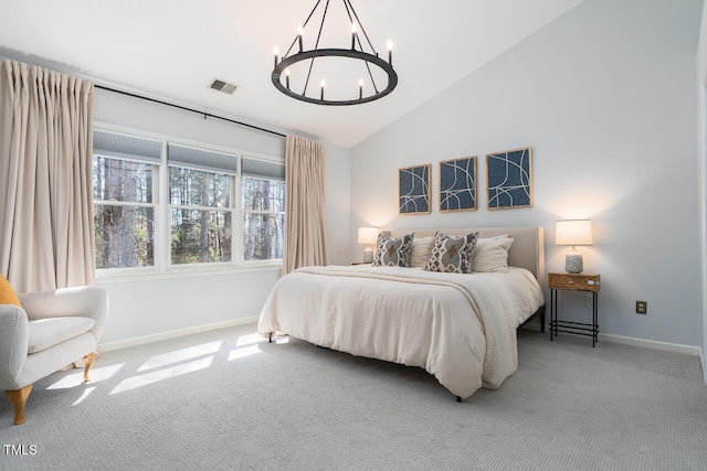 carpeted bedroom with visible vents, baseboards, an inviting chandelier, and high vaulted ceiling