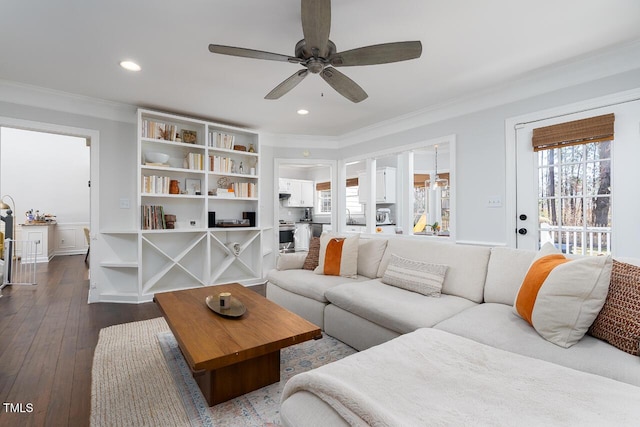 living room featuring a ceiling fan, recessed lighting, dark wood-style floors, and ornamental molding