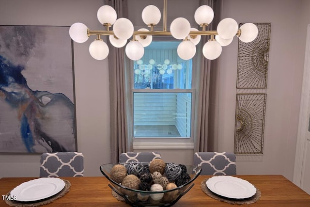 dining area featuring a chandelier